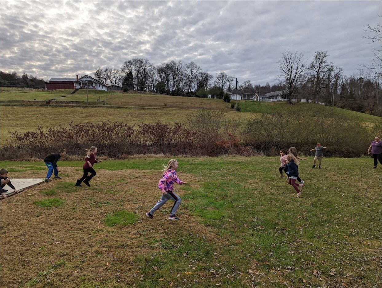 Children playing outside at Big Spring